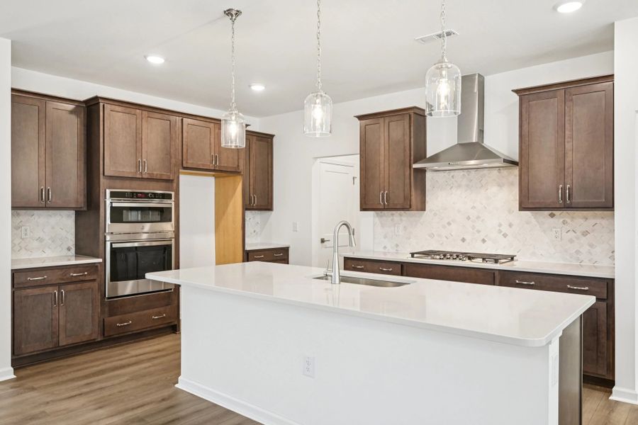 Kitchen featuring the AW Collection® Roosevelt - Bold finishes and refined design touches.