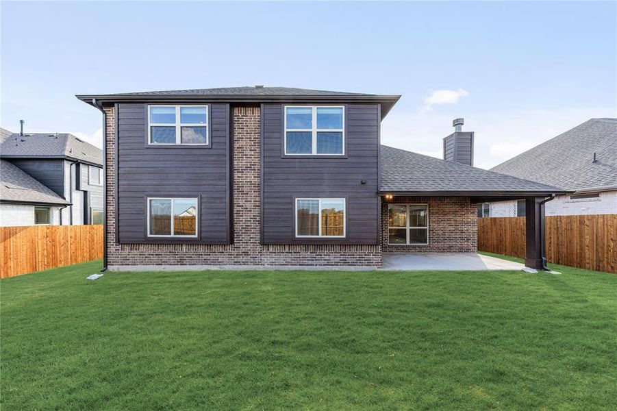 Exterior details and patio area of a home in West Crossing, Anna (Image 27). Exterior details and patio area of a home in West Crossing, Anna (Image 27).