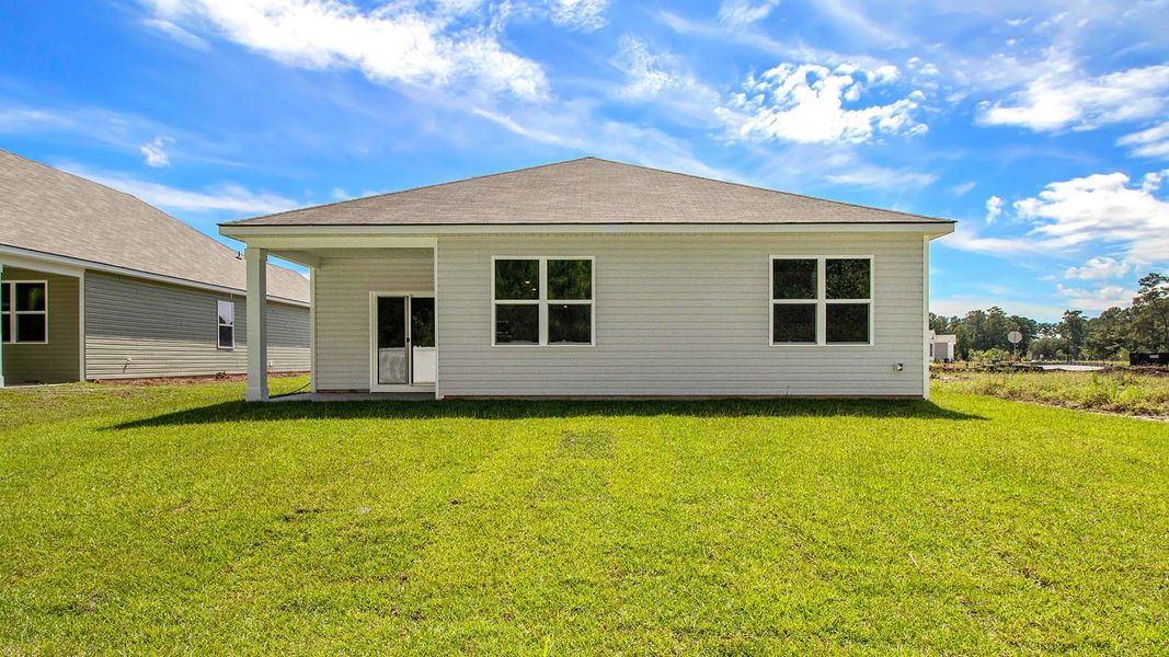 Exterior details and patio area of a home in Sandridge Park, Little River (Image 4). Exterior details and patio area of a home in Sandridge Park, Little River (Image 4).