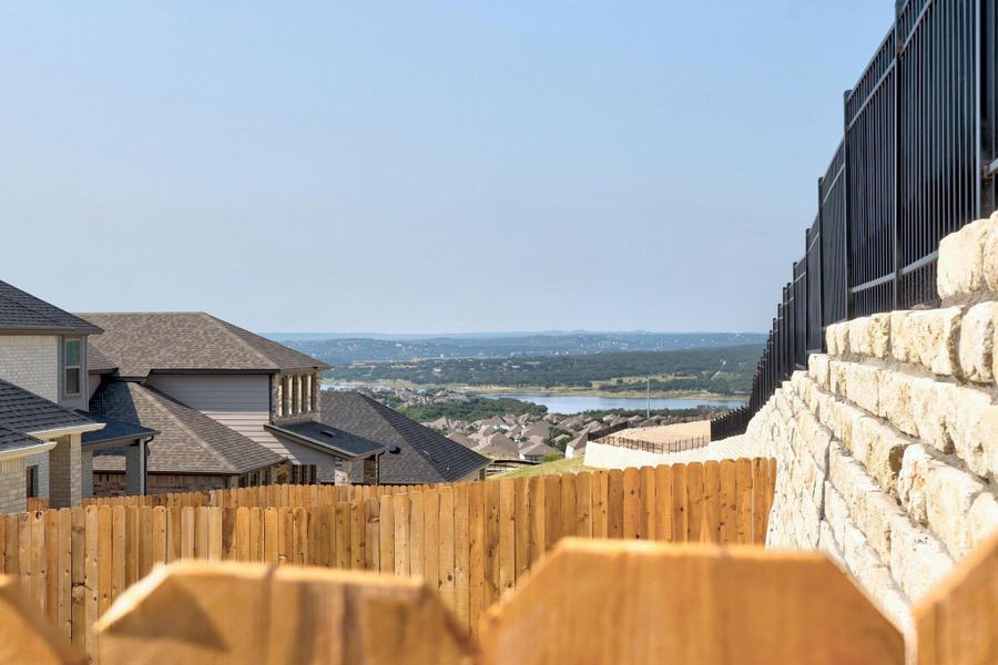 Exterior details and patio area of a home in Lakeside at Tessera, Lago Vista (Image 20).