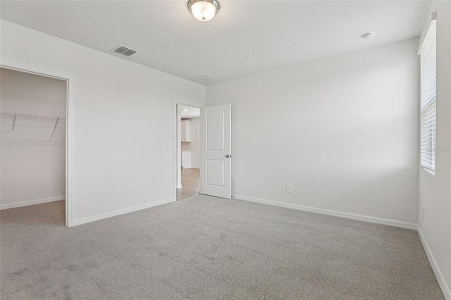 Spacious, unfurnished interior of a new home in Crosswinds - Signature Series, Haines City (Image 19).