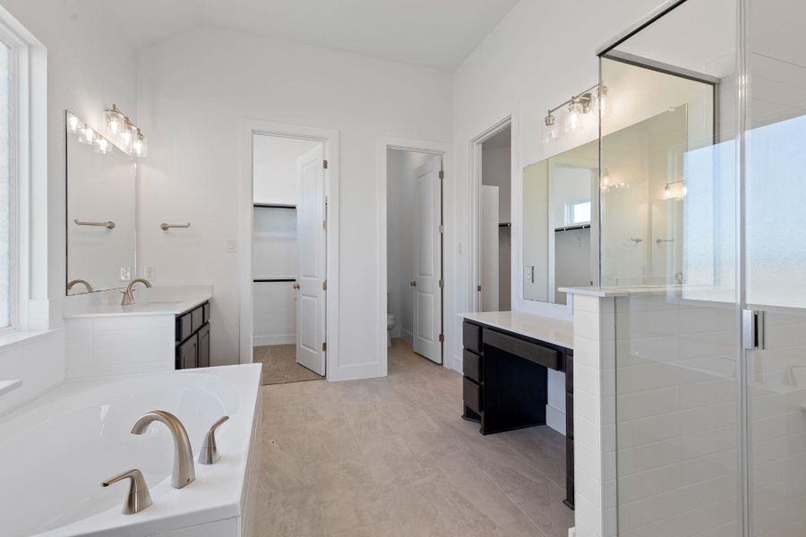 Primary Bath retreat with dual vanities & garden tub Primary Bath retreat with dual vanities & garden tub