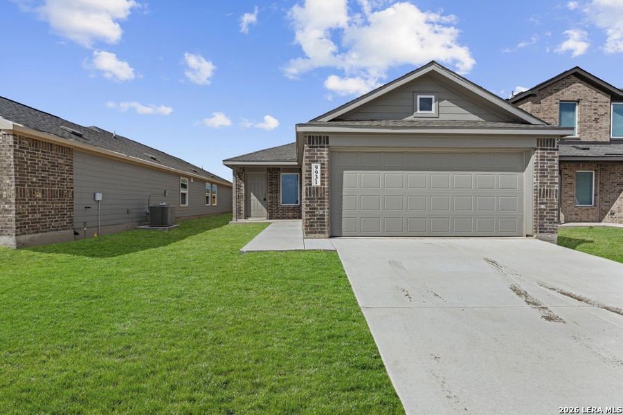 Front exterior of a new home in Randolph Crossing, Converse, TX, highlighting curb appeal (Image 16). Front exterior of a new home in Randolph Crossing, Converse, TX, highlighting curb appeal (Image 16).