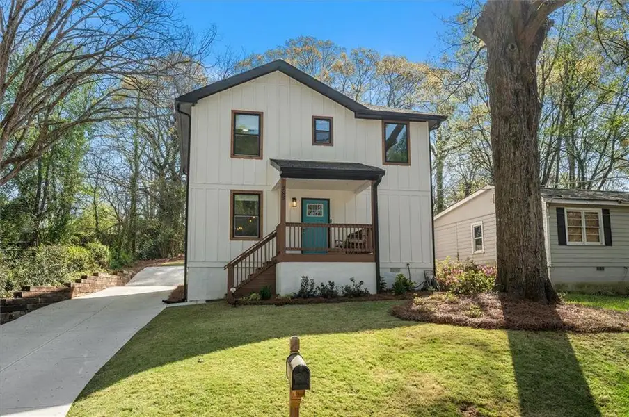 Front exterior of a new home in , Scottdale, GA, highlighting curb appeal (Image 23).