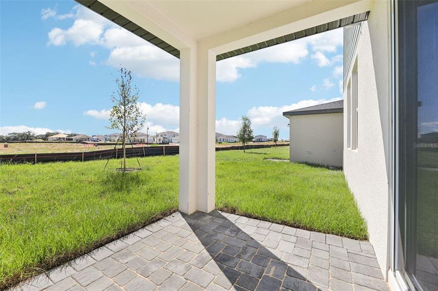 Exterior details and patio area of a home in Crosswinds - Signature Series, Haines City (Image 22).