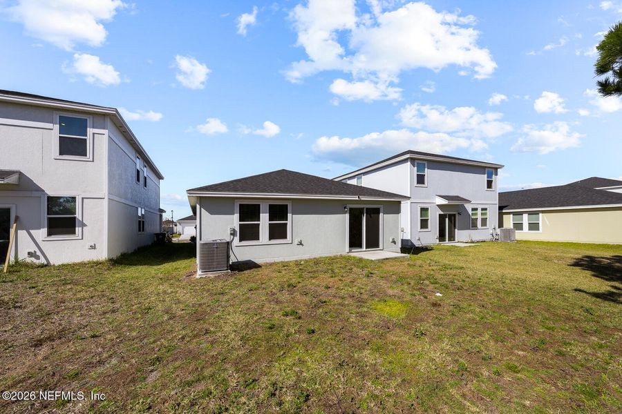 Exterior details and patio area of a home in Lakes at Bella Lago – Classic Series, Green Cove Springs (Image 18).