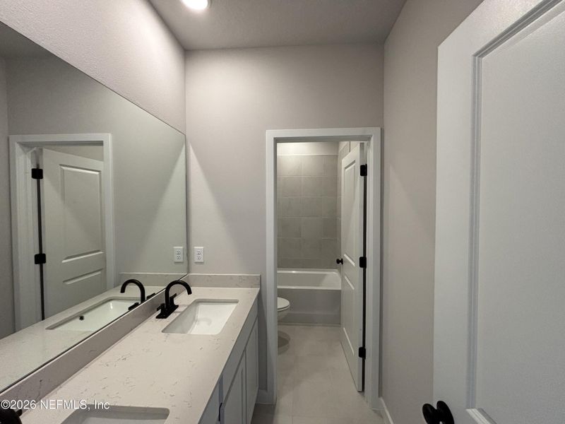 Furnished interior view inside a new home in Reserve East, Flagler Beach (Image 7).