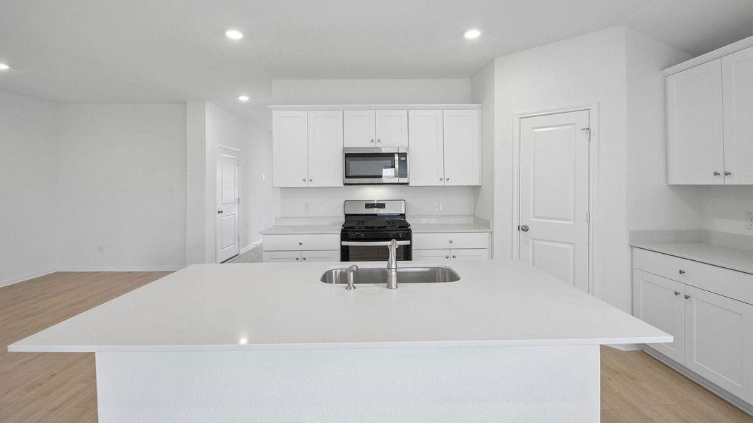 Furnished interior view inside a new home in Southgrove, Kyle (Image 6).