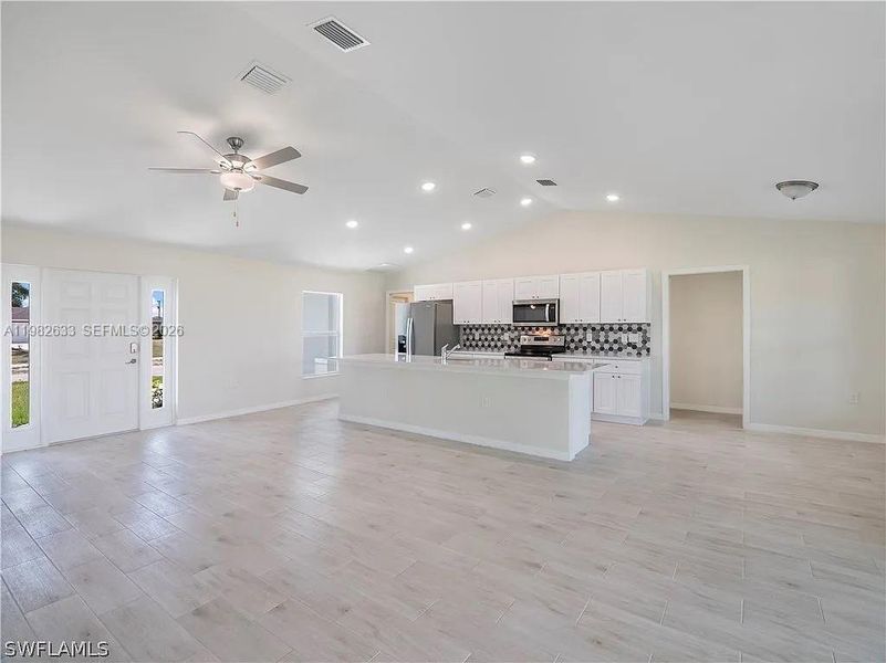 Spacious, unfurnished interior of a new home in , Cape Coral (Image 9). Spacious, unfurnished interior of a new home in , Cape Coral (Image 9).