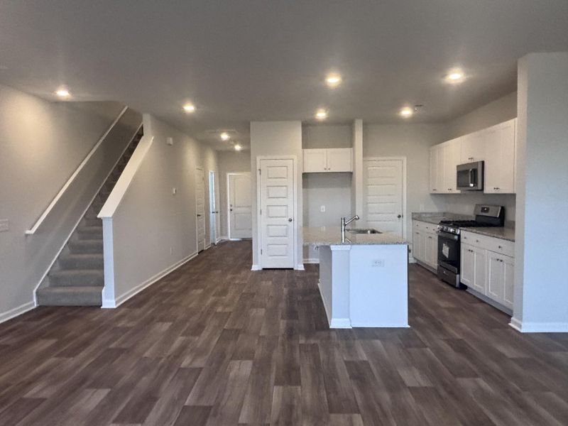 Furnished interior view inside a new home in Lindera Preserve at Cane Bay Plantation: Townhomes, Summerville (Image 8). Furnished interior view inside a new home in Lindera Preserve at Cane Bay Plantation: Townhomes, Summerville (Image 8).