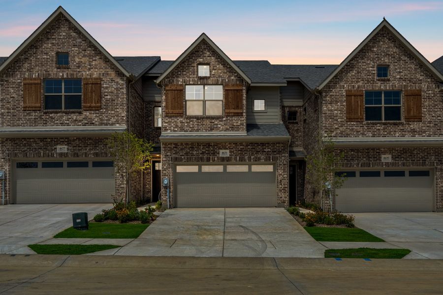 Front exterior of a new home in Wildridge, Oak Point, TX, highlighting curb appeal (Image 25). Front exterior of a new home in Wildridge, Oak Point, TX, highlighting curb appeal (Image 25).