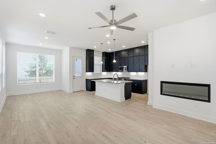 Furnished interior view inside a new home in Rose Hill, San Antonio (Image 3).