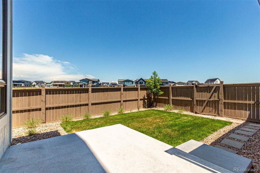 Front exterior of a new home in West Grange, Longmont, CO, highlighting curb appeal (Image 23).
