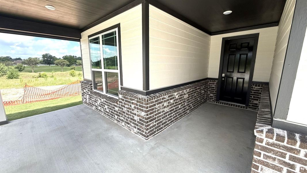 Imagine stepping into your own personal oasis—a spacious covered front porch that invites you to savor every moment outdoors, regardless of the weather.