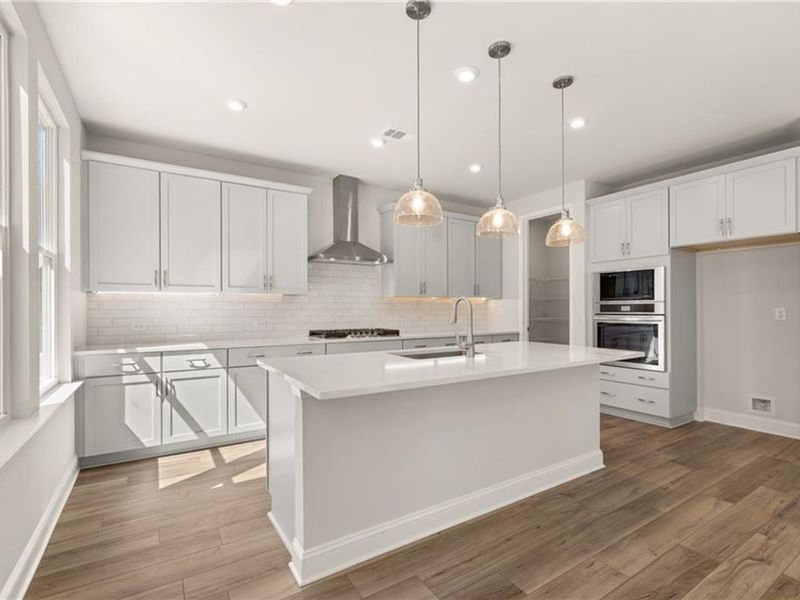 Furnished interior view inside a new home in Melody Lakeside Estates, Buford (Image 5).