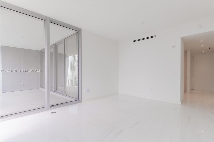 Spacious, unfurnished interior of a new home in Aston Martin Residences, Miami (Image 33).