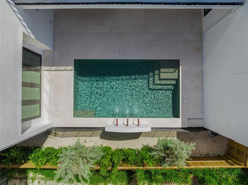 Exterior details and patio area of a home in , Sarasota (Image 3).