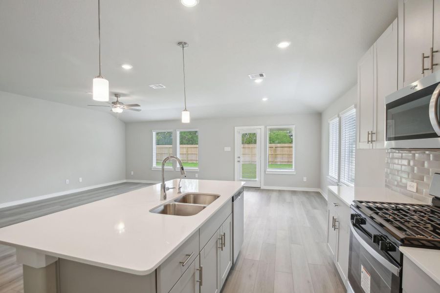 Furnished interior view inside a new home in Massey Oaks - Premier Series, Pearland (Image 13). Furnished interior view inside a new home in Massey Oaks - Premier Series, Pearland (Image 13).