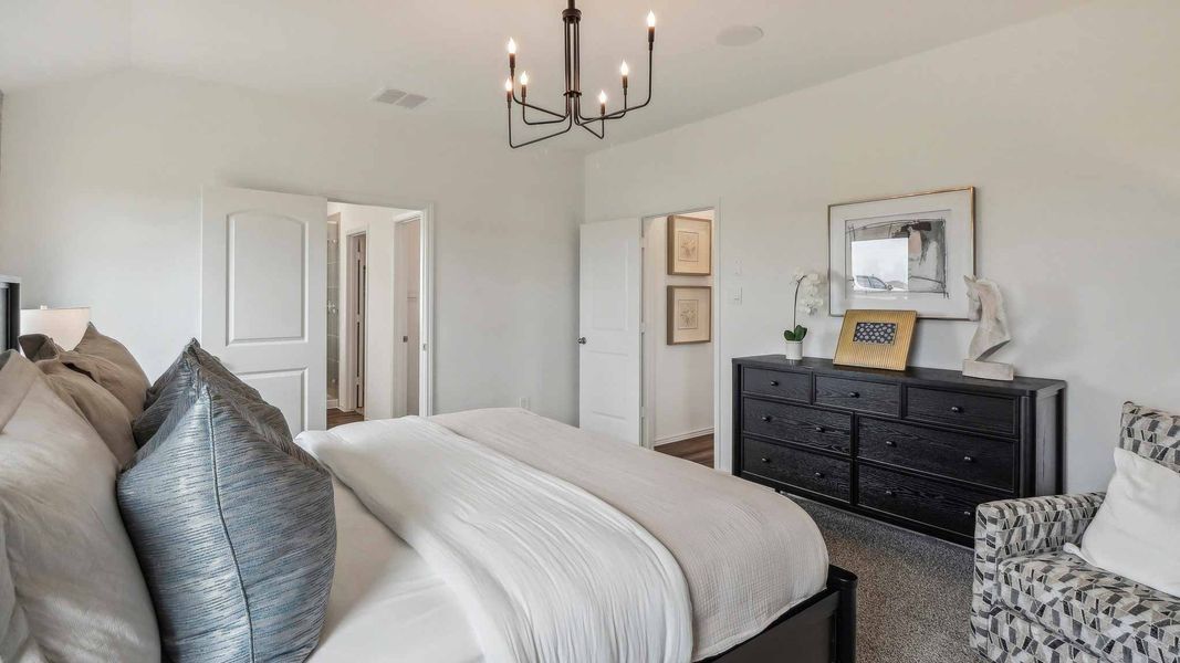 Furnished interior view inside a new home in Sunterra, Katy (Image 29).