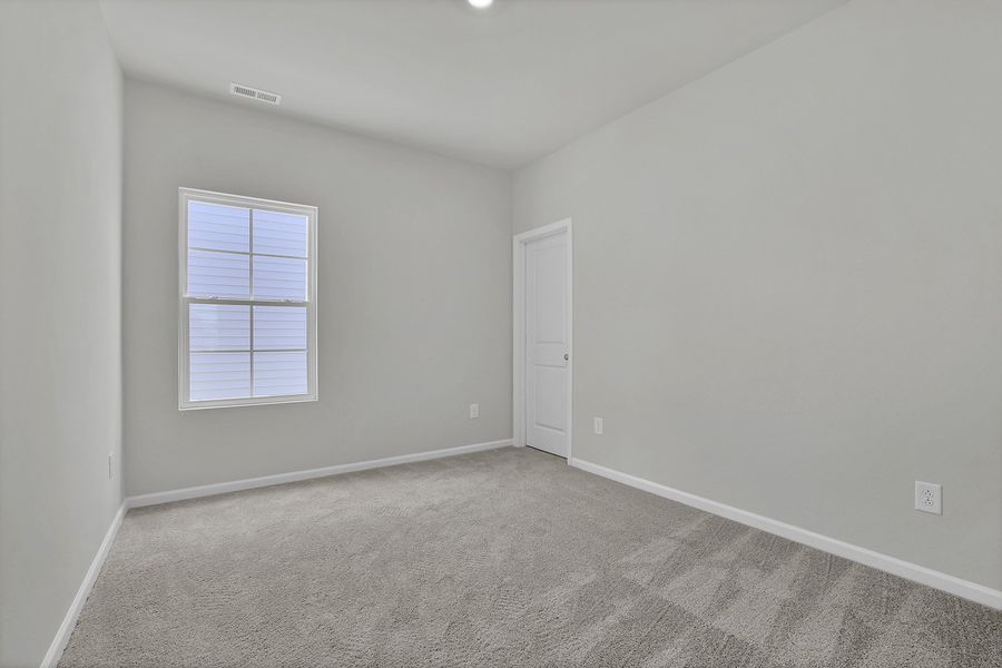 Spacious, unfurnished interior of a new home in River Tide Farms, Bolivia (Image 18).