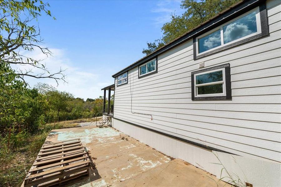 Exterior details and patio area of a home in , Whitney (Image 10).
