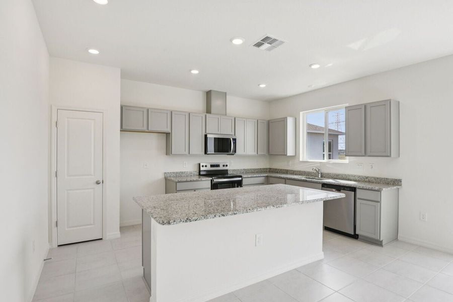 Furnished interior view inside a new home in The Preserve at Legends Pointe II, Hudson (Image 5).