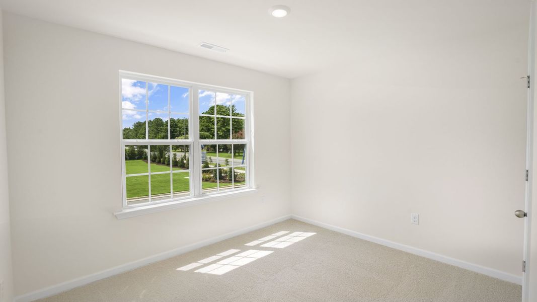 Spacious, unfurnished interior of a new home in Thornton Townes, Raleigh (Image 21).