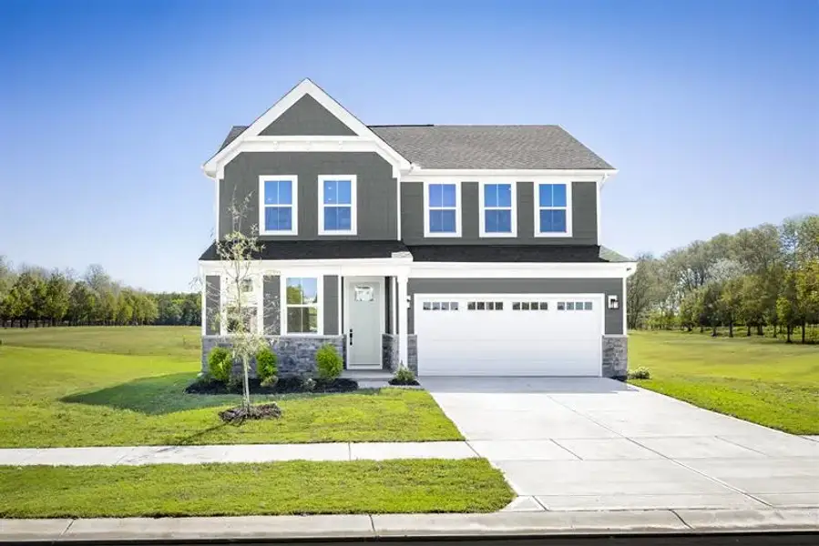 Representative exterior photo of a completed home built from the Corbin by Ryan Homes in Shinn Farms, Troutman, NC (Image 1). Representative exterior photo of a completed home built from the Corbin by Ryan Homes in Shinn Farms, Troutman, NC (Image 1).