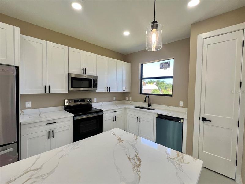 Furnished interior view inside a new home in , Port Charlotte (Image 13).