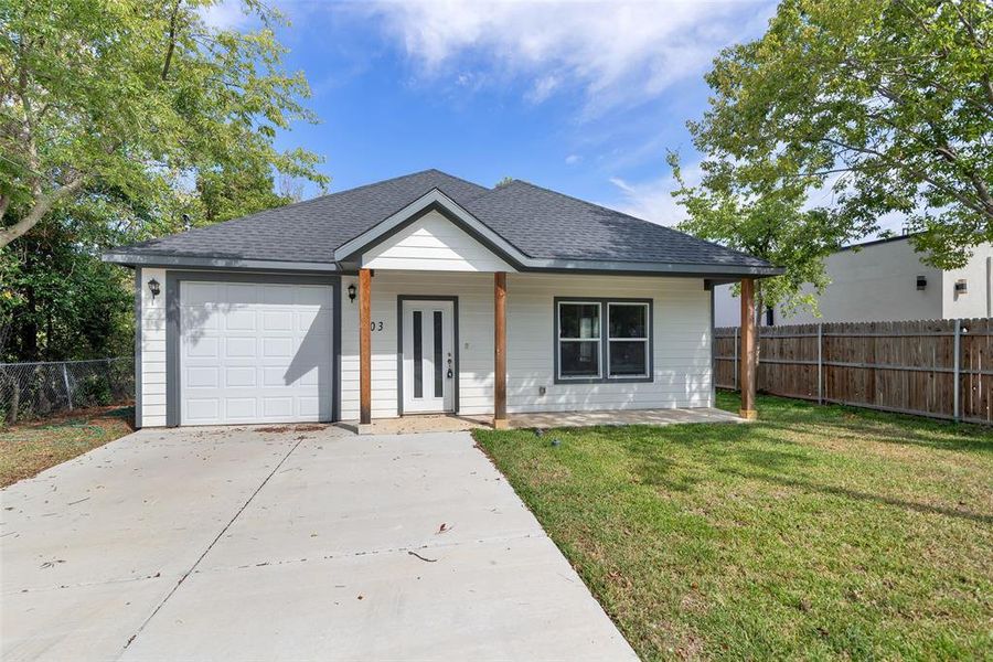 Exterior details and patio area of a home in , Denison (Image 2). Exterior details and patio area of a home in , Denison (Image 2).