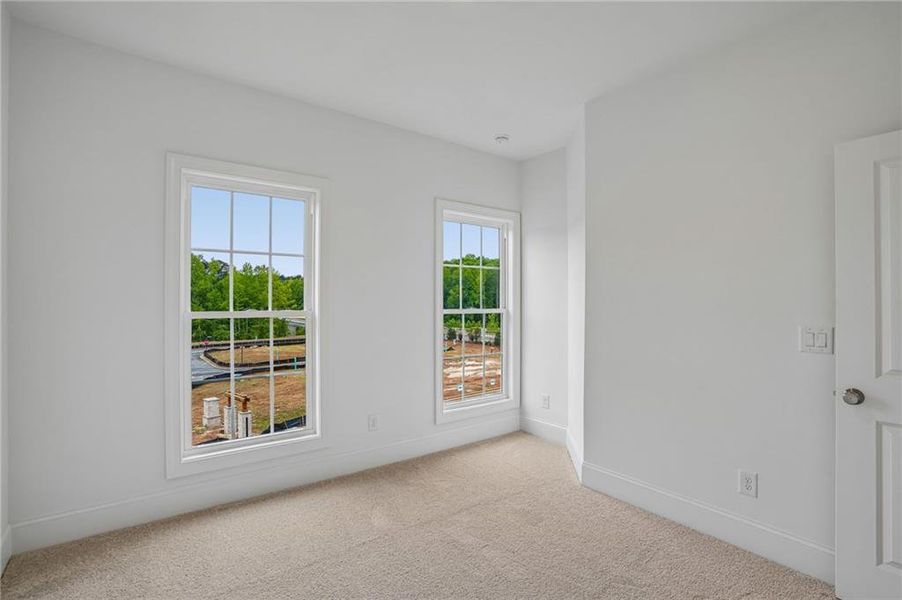 Spacious, unfurnished interior of a new home in Waterhaven, Cumming (Image 16).