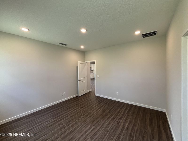 Spacious, unfurnished interior of a new home in The Magnolia Series at Reserve East, Flagler Beach (Image 11).