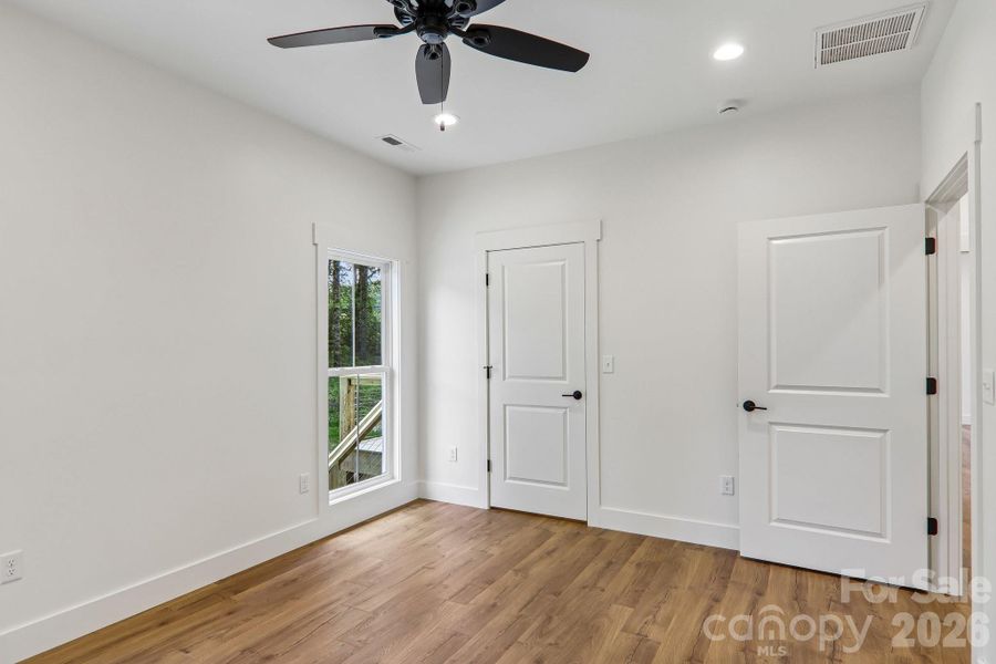Spacious, unfurnished interior of a new home in , Hendersonville (Image 36).