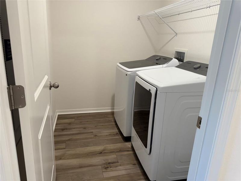 Upstairs laundry room with washer and dryer