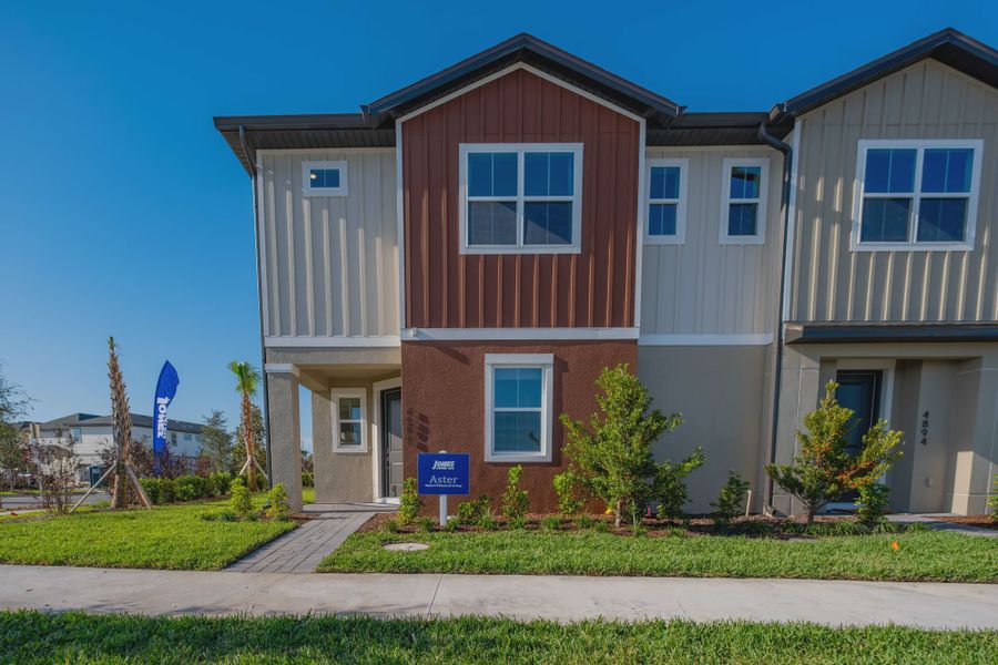 Representative exterior photo of a completed home built from the Aster by Jones Homes USA in Havenfield at Crossprairie, St. Cloud, FL (Image 8). Representative exterior photo of a completed home built from the Aster by Jones Homes USA in Havenfield at Crossprairie, St. Cloud, FL (Image 8).