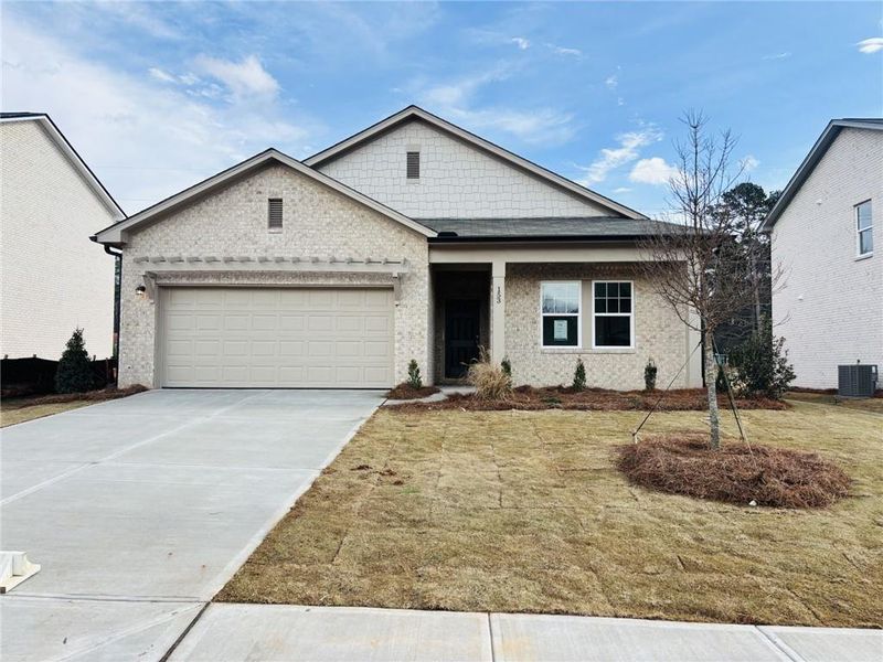 Front exterior of a new home in Kendall Grove, McDonough, GA, highlighting curb appeal (Image 5).