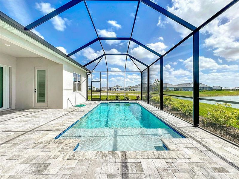 Exterior details and patio area of a home in Watercolor Place, Bradenton (Image 35).