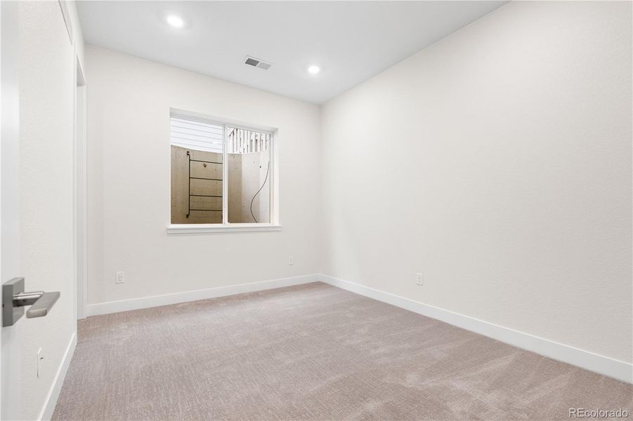 Spacious, unfurnished interior of a new home in Autograph at Lyric, Lone Tree (Image 21).