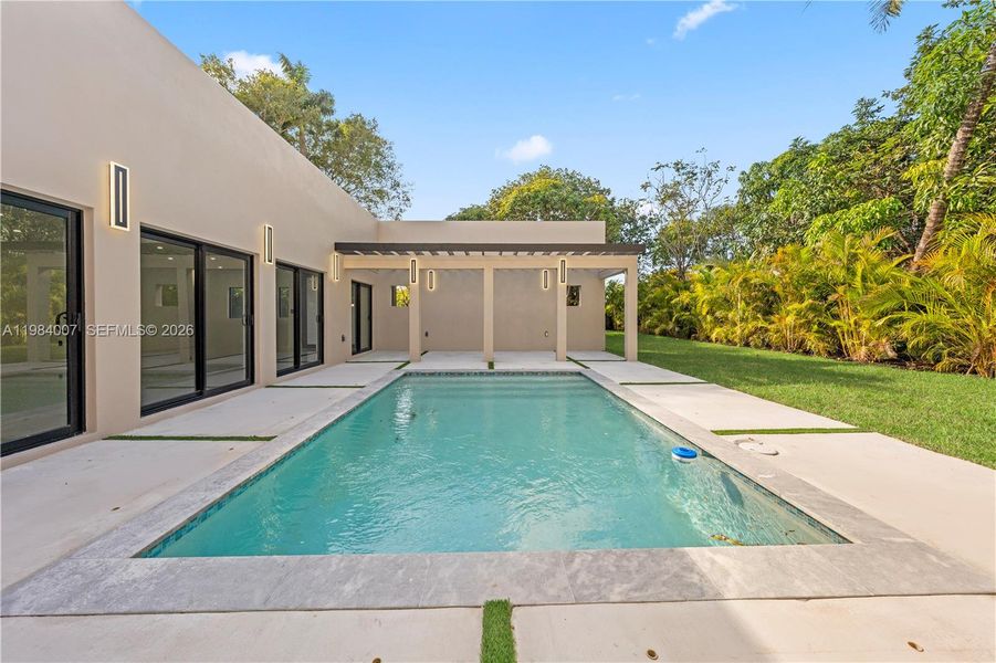 Exterior details and patio area of a home in , North Miami (Image 39).