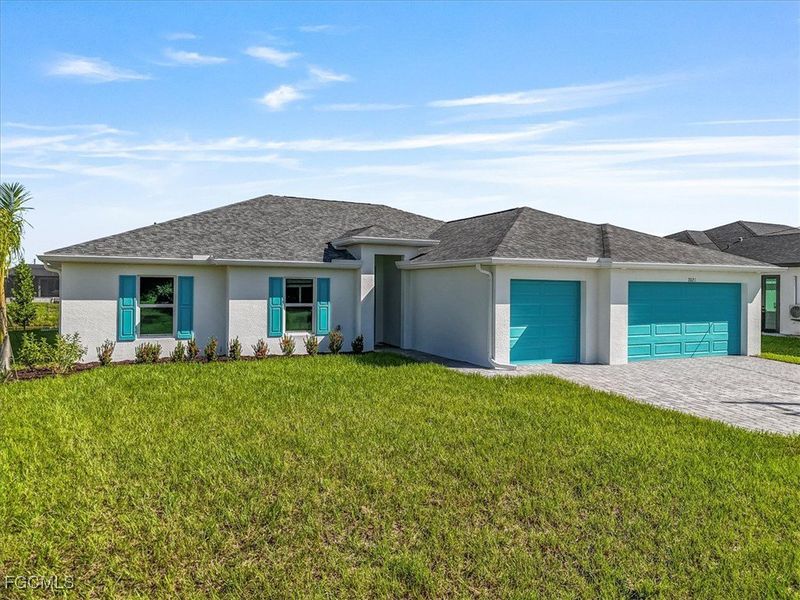 Front exterior of a new home in Cape Coral, Cape Coral, FL, highlighting curb appeal (Image 17).