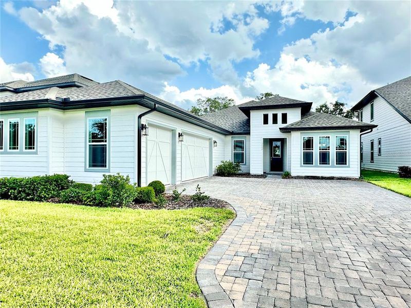 Exterior details and patio area of a home in Northlake Traditional, Winter Garden (Image 29). Exterior details and patio area of a home in Northlake Traditional, Winter Garden (Image 29).