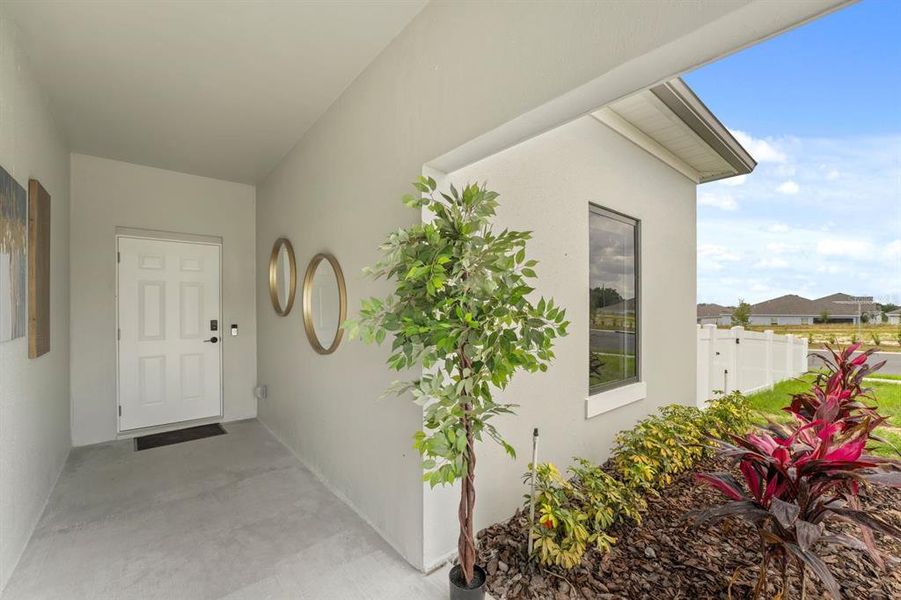 Exterior details and patio area of a home in On Villa Pass, Mascotte (Image 2). Exterior details and patio area of a home in On Villa Pass, Mascotte (Image 2).