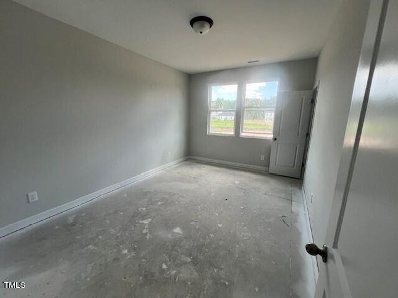 Spacious, unfurnished interior of a new home in Wellers Knoll, Lillington (Image 47).
