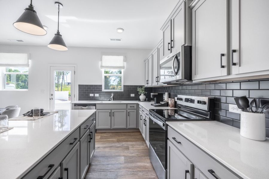 Furnished interior view inside a new home in Dukes Ridge, Charlotte (Image 3).