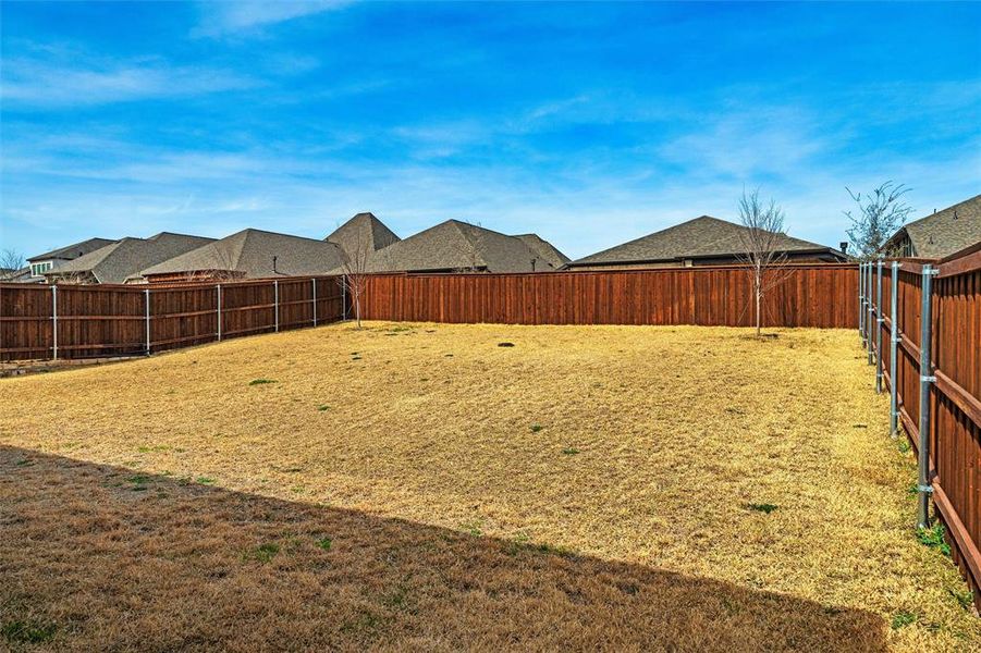 Exterior details and patio area of a home in Walsh, Fort Worth (Image 28).