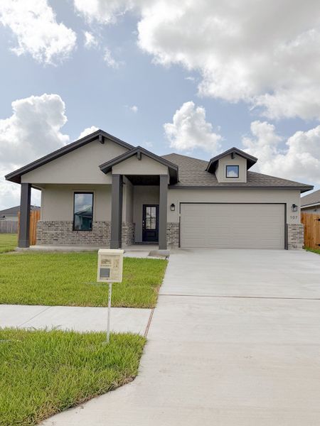 Front exterior of a new home in TerraVista, Victoria, TX, highlighting curb appeal (Image 30).