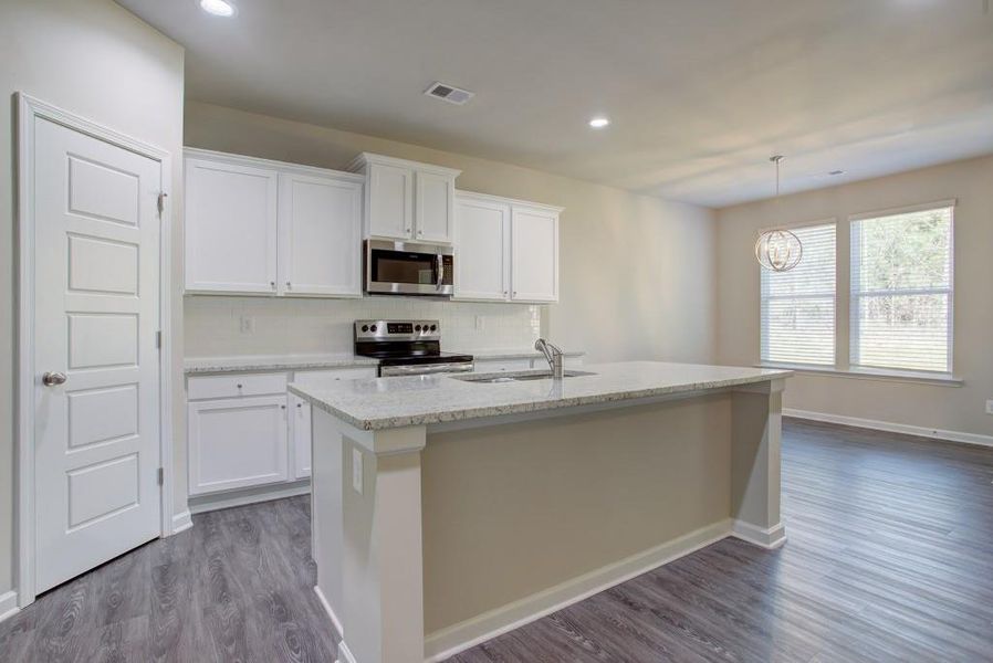 Furnished interior view inside a new home in Sutton's Landing, Statham (Image 5).