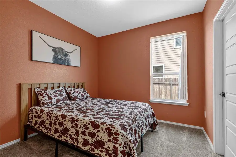 A restful bedroom offers a cozy ambiance for tranquil slumber.