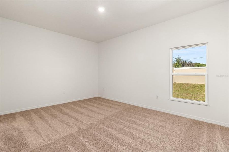 Spacious, unfurnished interior of a new home in Peach Crossings, Winter Haven (Image 13).