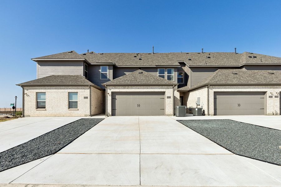 Front exterior of a new home in Creekshaw, Royse City, TX, highlighting curb appeal (Image 27).